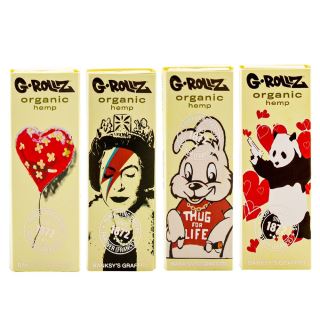 31446 - Papel de fumar G-Rollz 1.1/4 & Tips Banksy 24 librillos